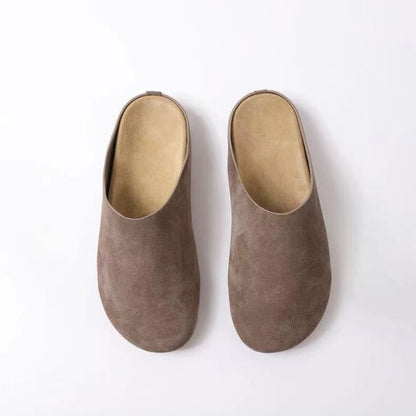 Suede slip-on flats with a round toe design