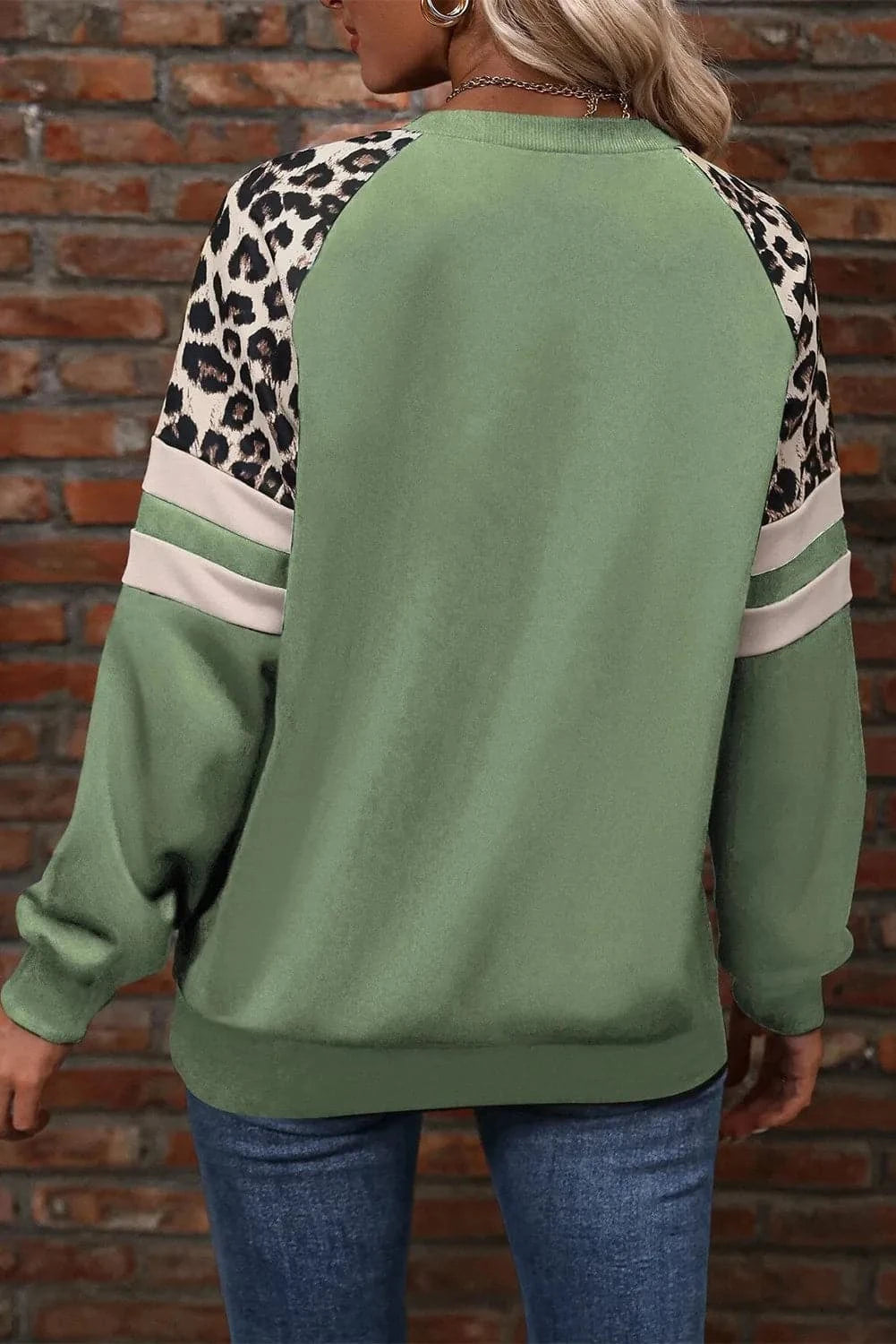 Leopard Round Neck Long Sleeve Sweatshirt.