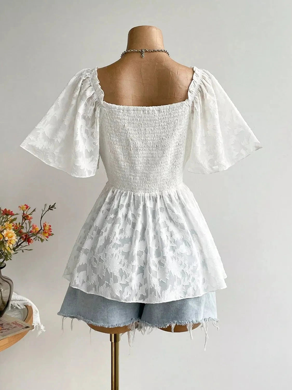 Plus Size Floral Flutter Sleeve Blouse with Smocked Back Coco’s Tee Boutique