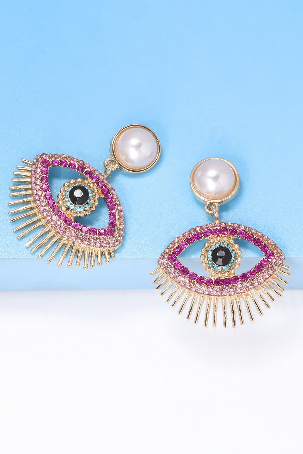 Rhinestone evil eye earrings