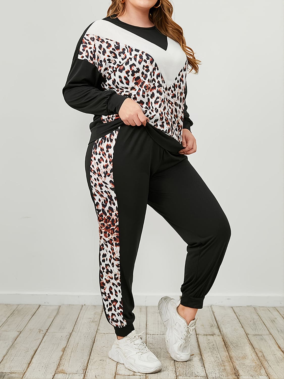 Plus Size Leopard Sweatshirt and Sweatpants Set.