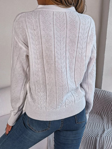 Chic cable-knit v-neck sweater with buttoned details