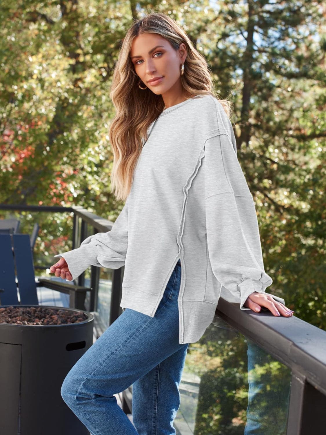 Slit Round Neck Long Sleeve Sweatshirt.