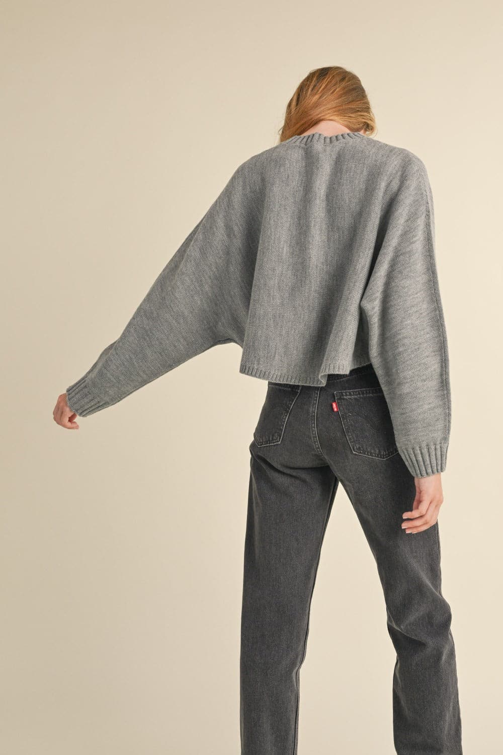 Chic cropped sweater with dolman sleeves and round neck