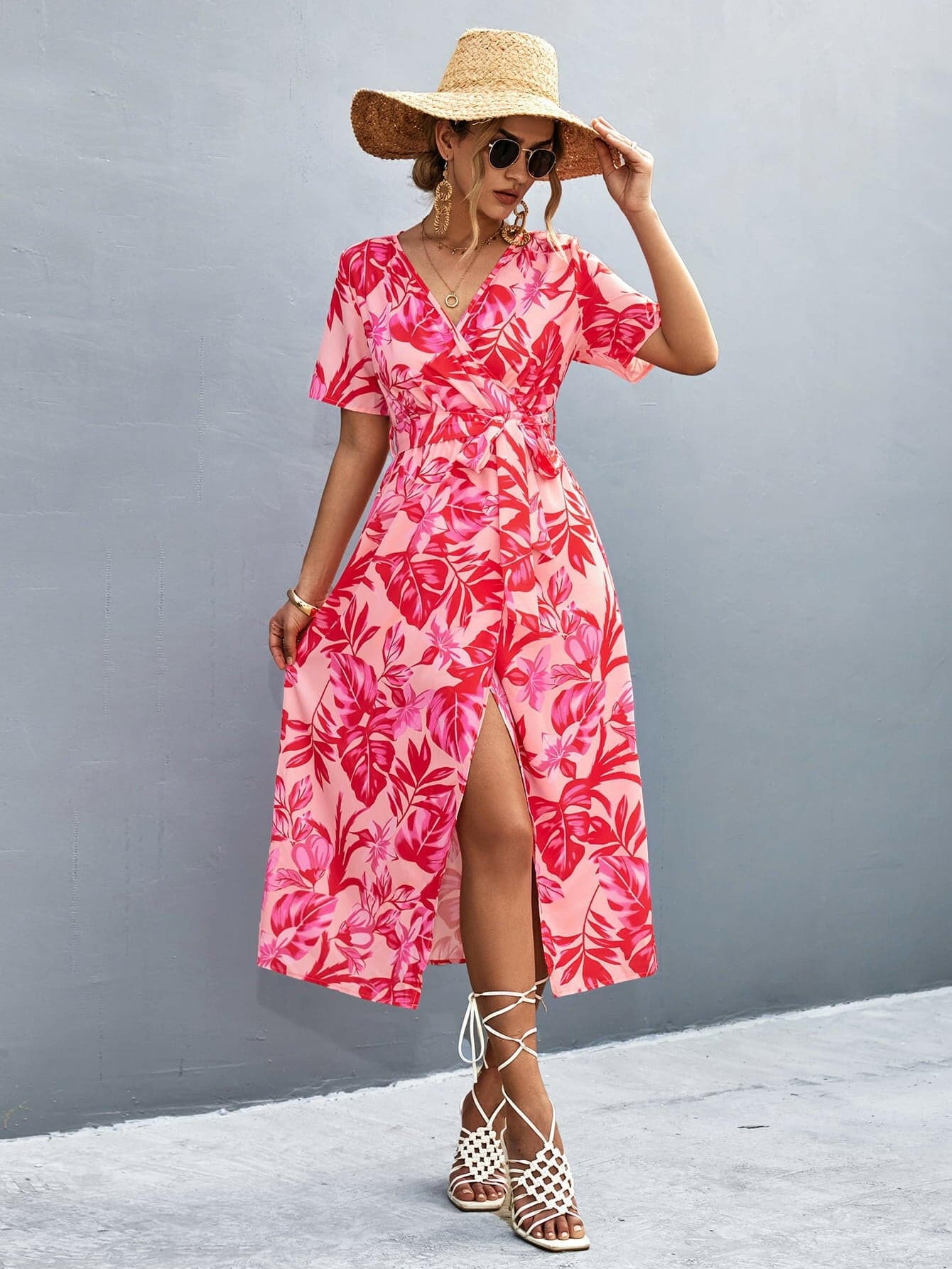 Floral print high slit midi dress with surplice neck and tie waist.