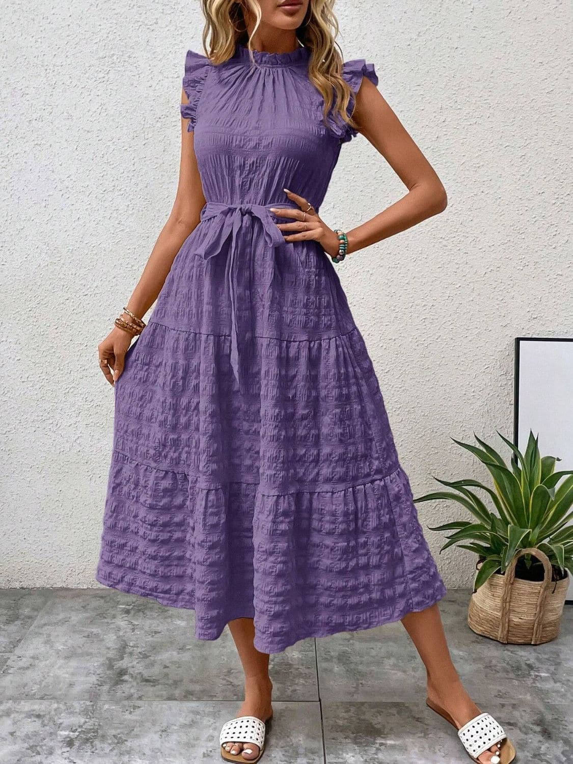 Ruffled cap sleeve midi dress in purple with tied waist, no stretch, and opaque material.