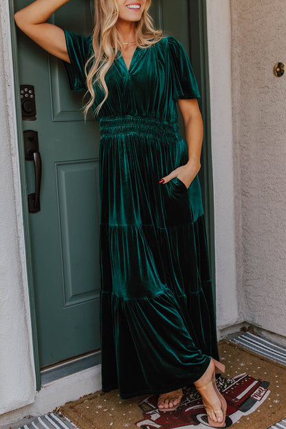 Evergreen velvet tiered maxi dress with shirred waist and short sleeves