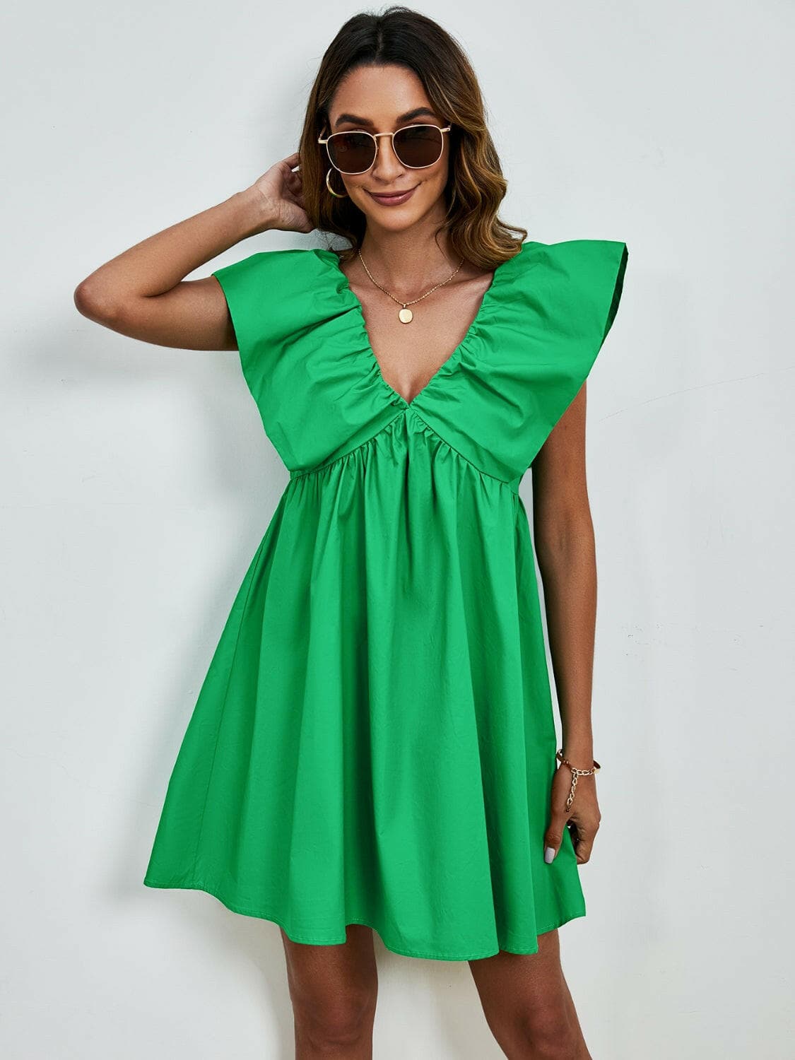 V-Neck Cap Sleeve Mini DressUpgrade Your Style with Our V-Neck Cap Sleeve Mini Dress
 Step out in confidence and elegance with our V-Neck Cap Sleeve Mini Dress, a versatile piece that effortlesLove Salve -Neck Cap Sleeve Mini Dress