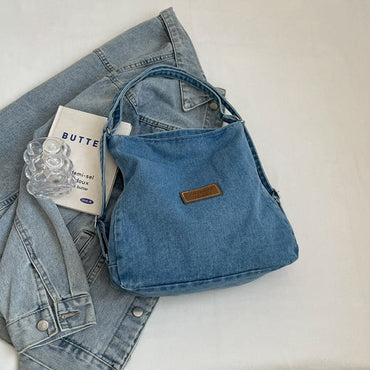 Versatile denim shoulder bag with adjustable straps