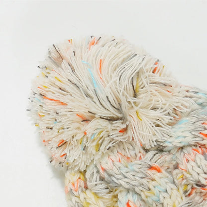 Cozy cable-knit beanie with playful pompom