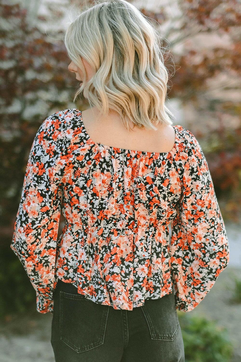 Floral Tied Flounce Sleeve Peplum Blouse.