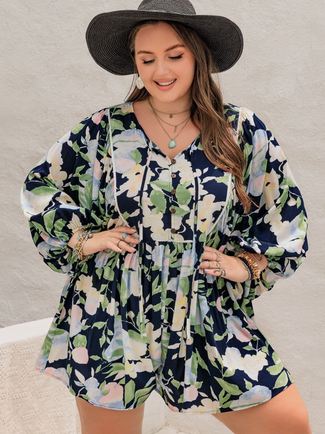 Plus Size Tied Printed Long Sleeve Romper.