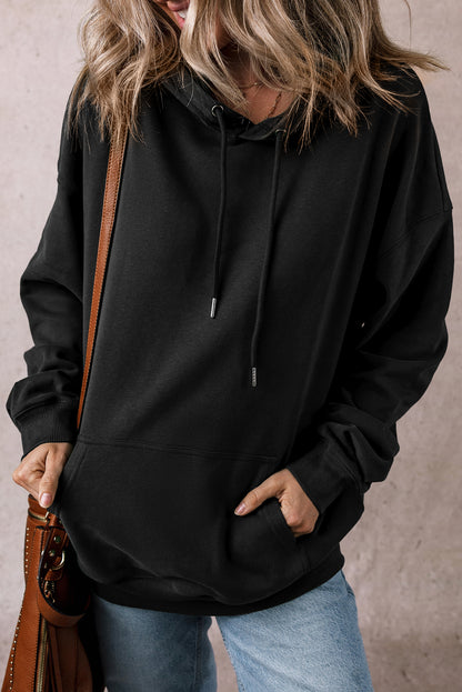 Cozy black fleece-lined hoodie with kangaroo pocket and drawstring design