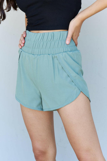 Ninexis Stay Active High Waistband Active Shorts in Pastel Blue.