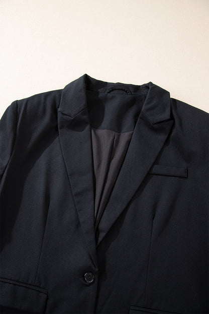 Chic black buttoned blazer with flap pockets