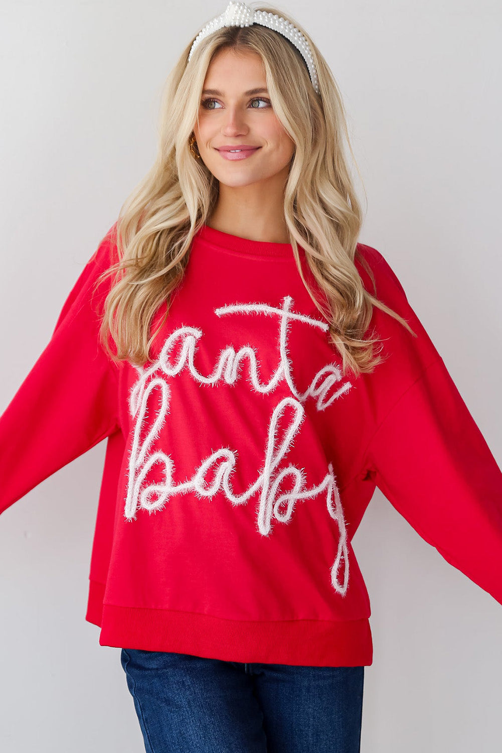 Festive red Santa baby tinsel graphic cozy sweatshirt