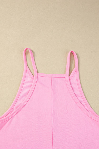 Chic pink sleeveless jersey romper with pockets and v-neck detail