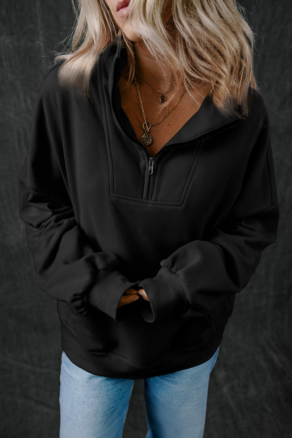 Chic black zip-up sweatshirt with kangaroo pockets