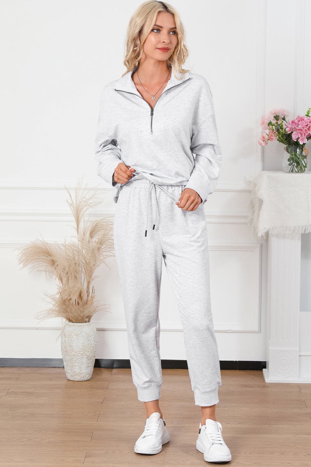 Half Zip Sweatshirt and Drawstring Sweatpants Set.