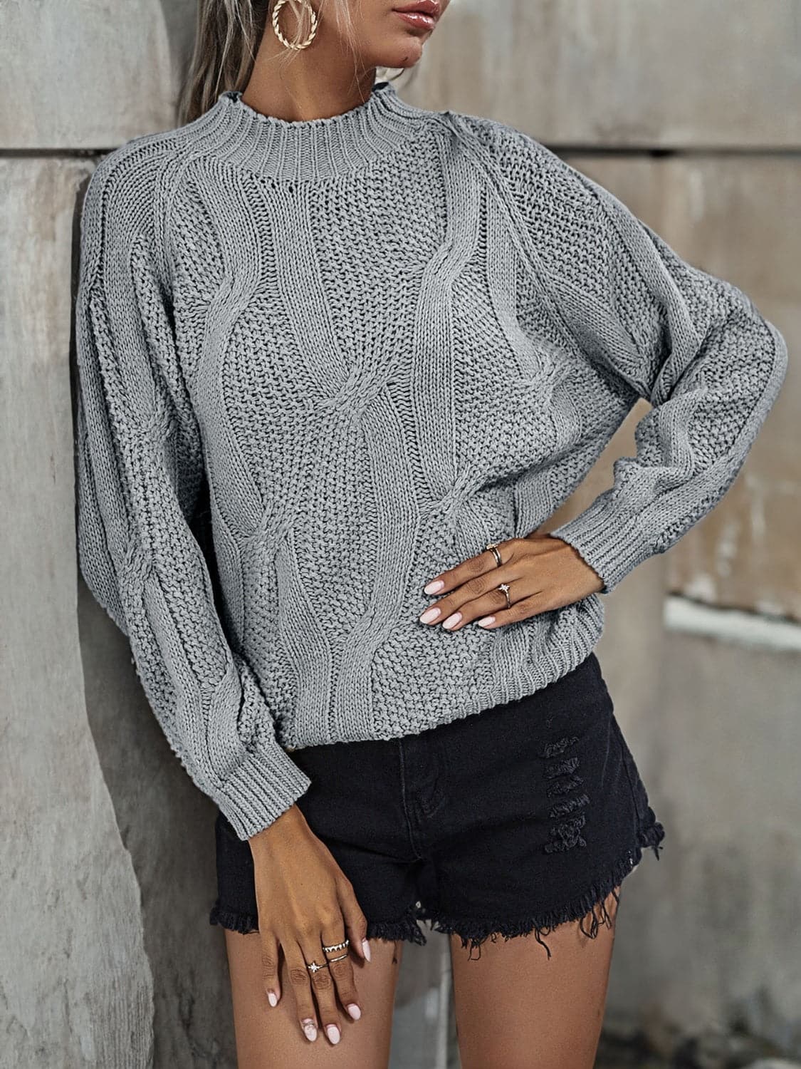 Rib-Knit Mock Neck Sweater.