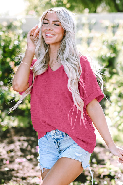 Chic bright pink rolled sleeve V neck tee for effortless style