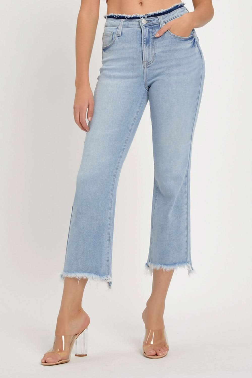 Edgy high rise cropped jeans with raw hem detail