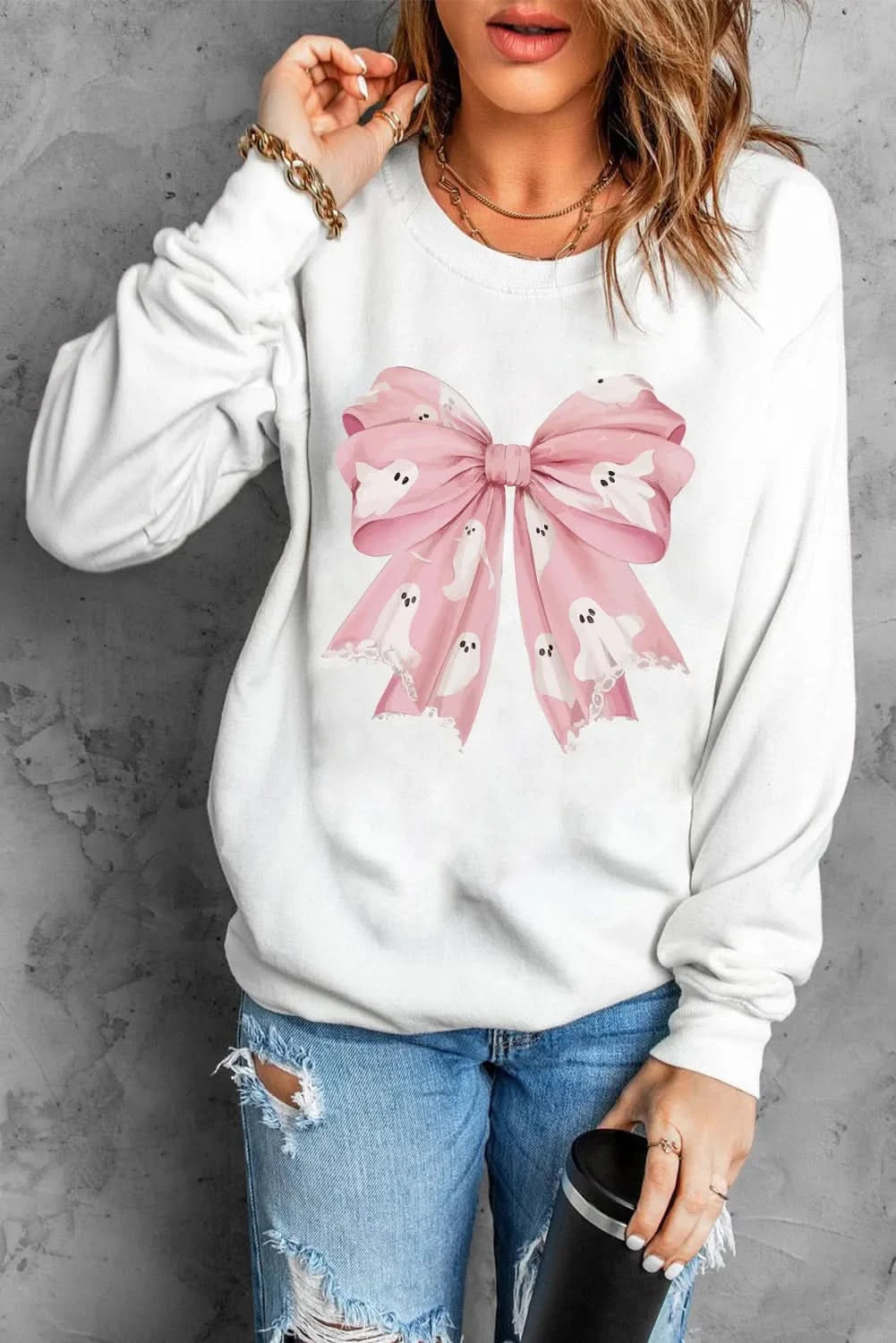 Bow Round Neck Long Sleeve Sweatshirt with pink bow design, casual and stylish.