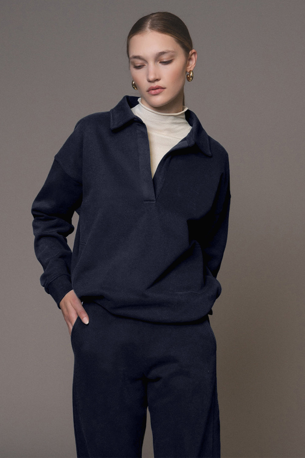 Navy blue pullover and joggers tracksuit with fold-down collar