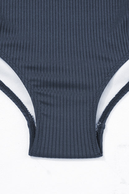 Navy blue ribbed cutout monokini with adjustable drawstring sides