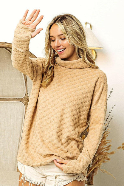 BiBi Checkered Round Neck Thumbhole Long Sleeve Top in beige, featuring a chic checkered pattern and stylish thumbhole sleeves, perfect for cozy fashion.