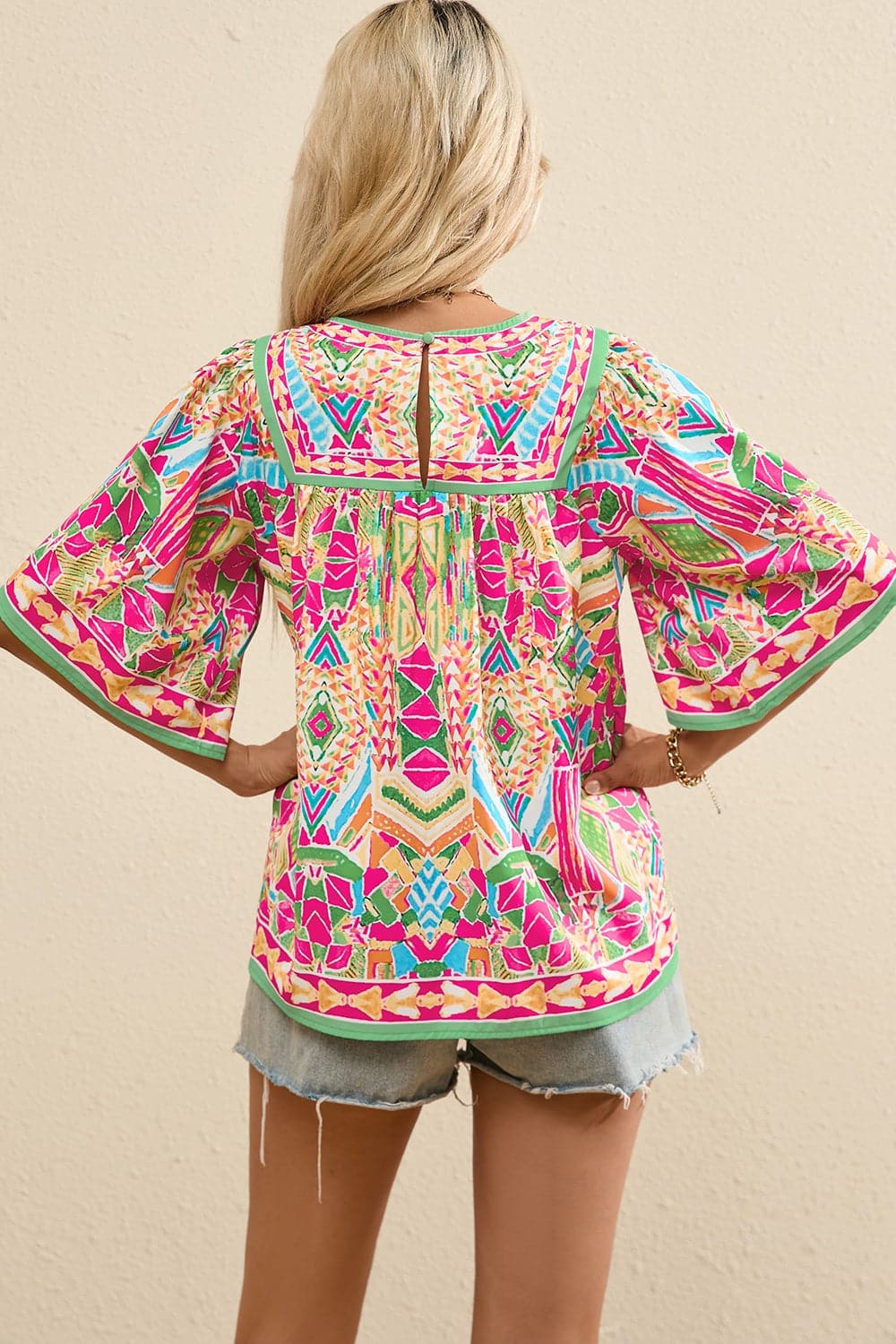 Printed Round Neck Half Sleeve Blouse.