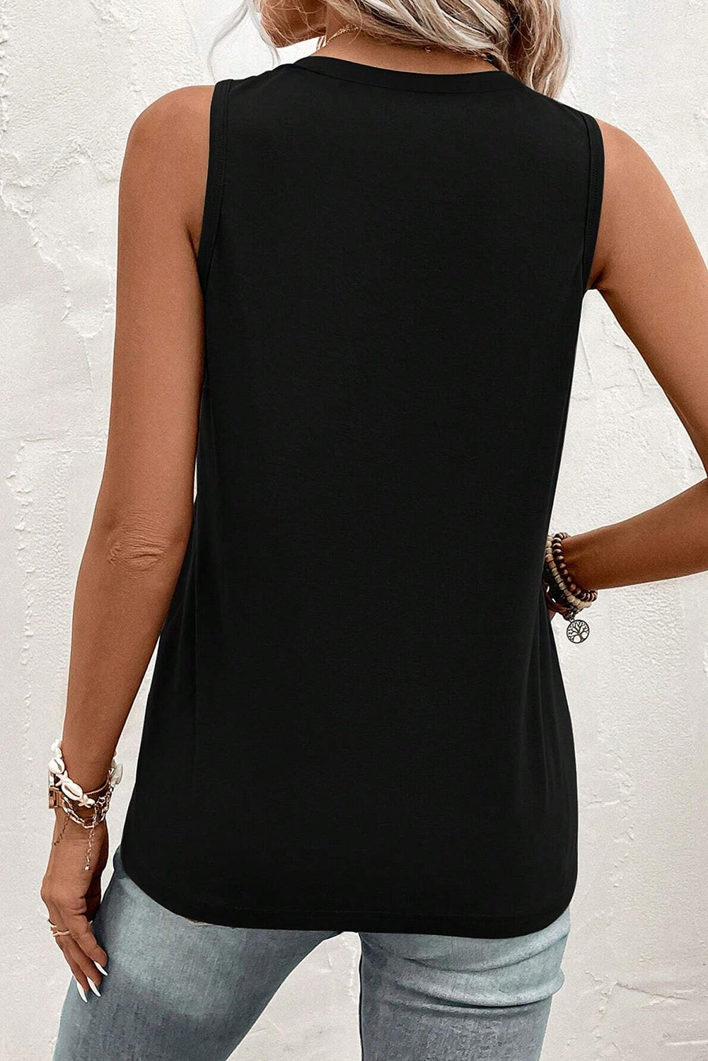 Chic black v-neck tank top with half buttons and patched pocket