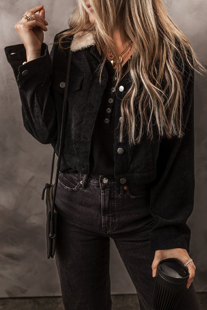 Cozy black corduroy crop jacket with fleece lining and button-up closure