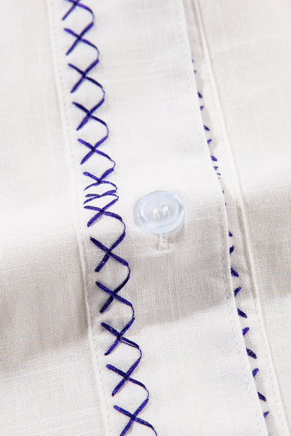 Embroidered floral shirt with bracelet sleeves in white