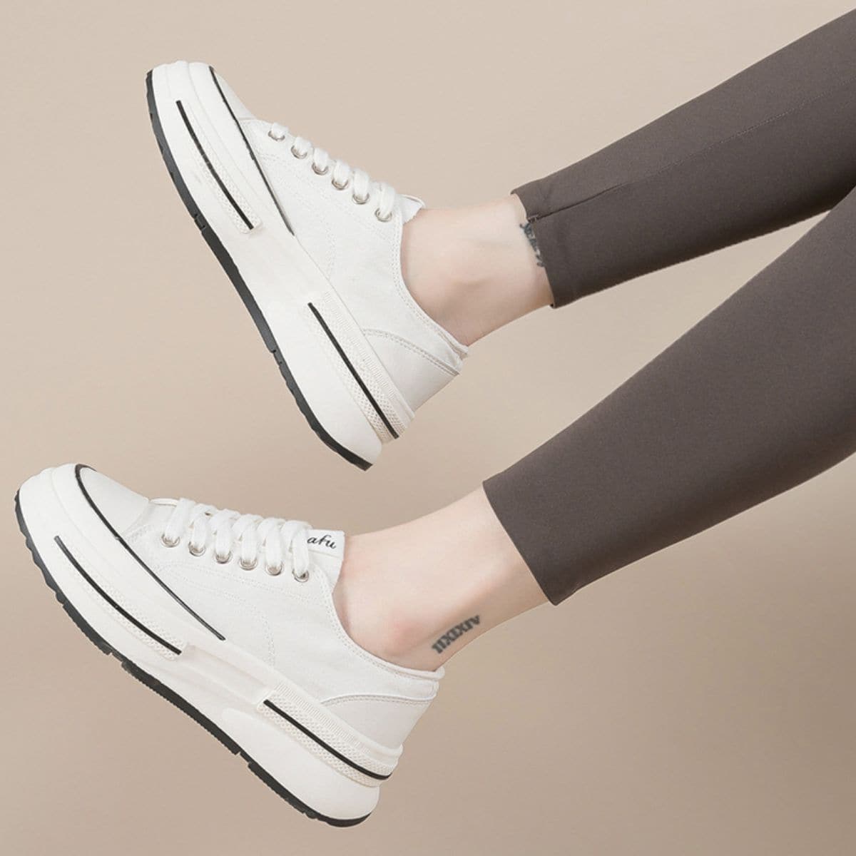 Tied round toe elevated sneakers