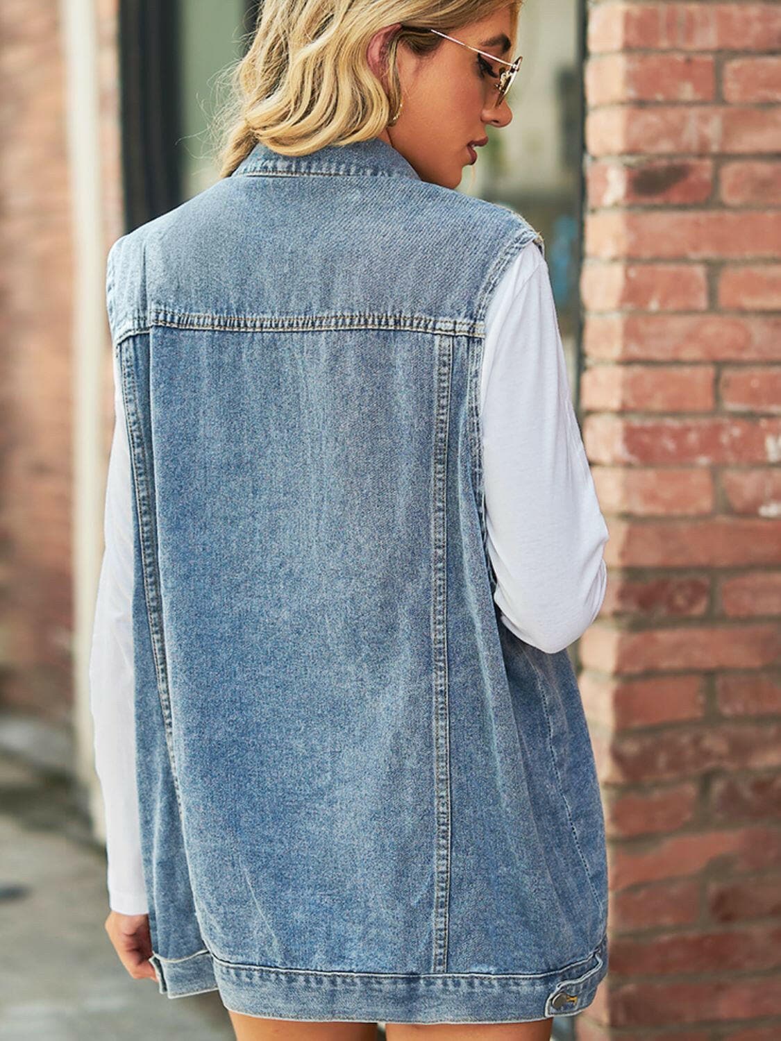 Collared Neck Sleeveless Denim Top with Pockets.