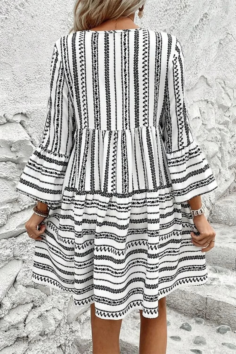 Chic printed tie neck mini dress with three-quarter sleeves