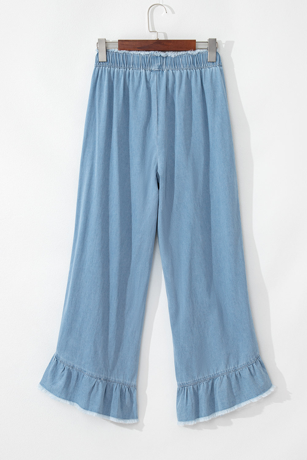 Myosotis light wash ruffled wide leg jeans with raw hem detail