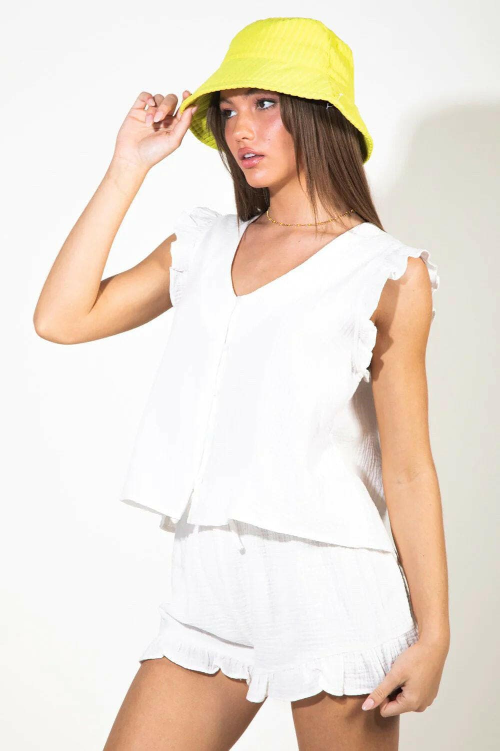 Ruffled V-Neck Cap Sleeve and Shorts SetRuffled V-Neck Cap Sleeve and Shorts Set
 Upgrade your style with our Ruffled V-Neck Cap Sleeve and Shorts Set! Step up your fashion game with this exquisite two-pieLove Salve -Neck Cap Sleevejust arrived