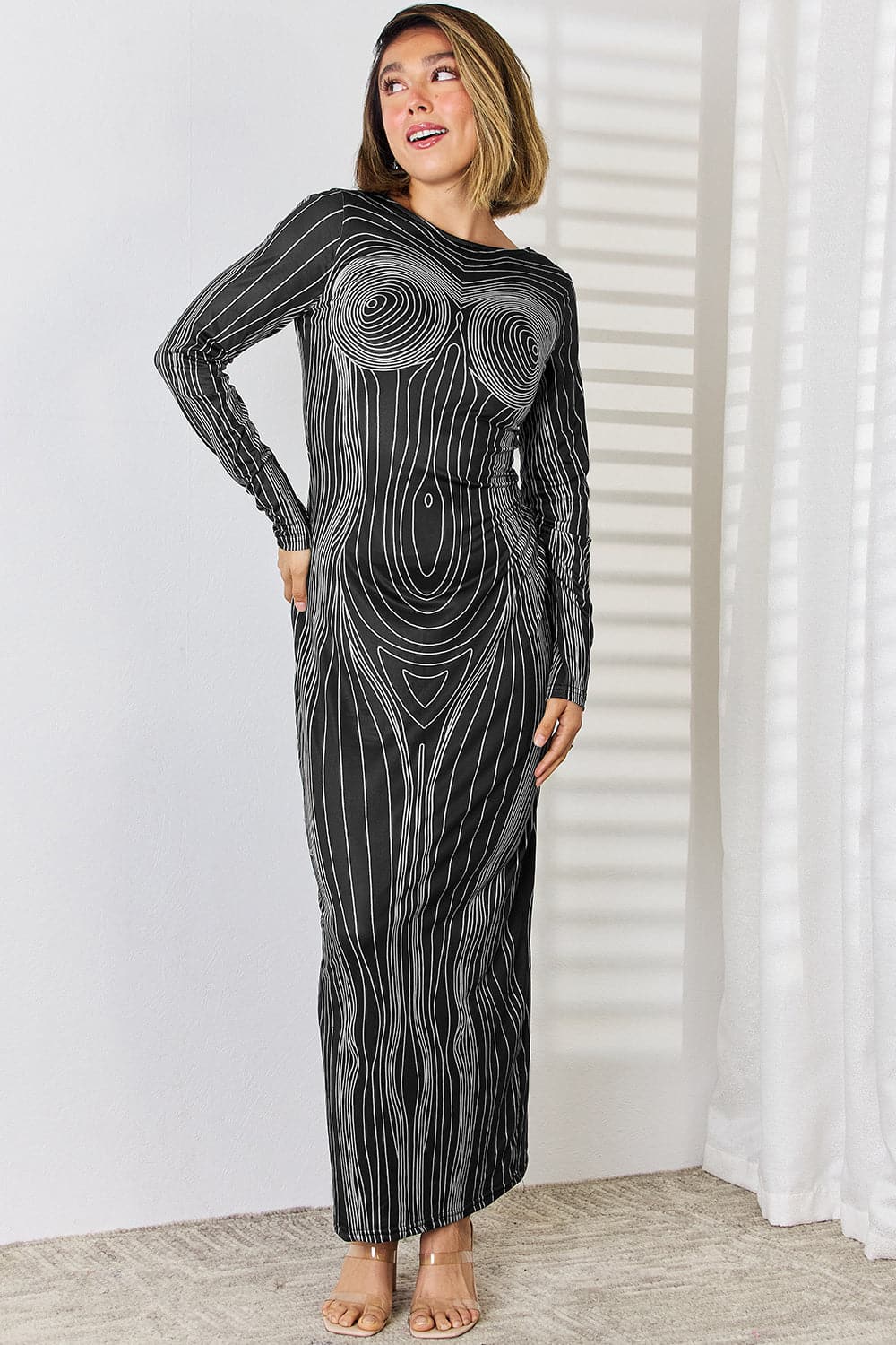 Cutout Round Neck Long Sleeve Maxi Dress.