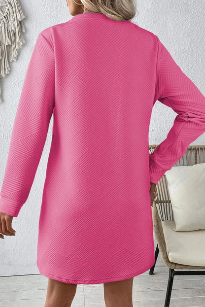 Textured long sleeve mini dress with round neck