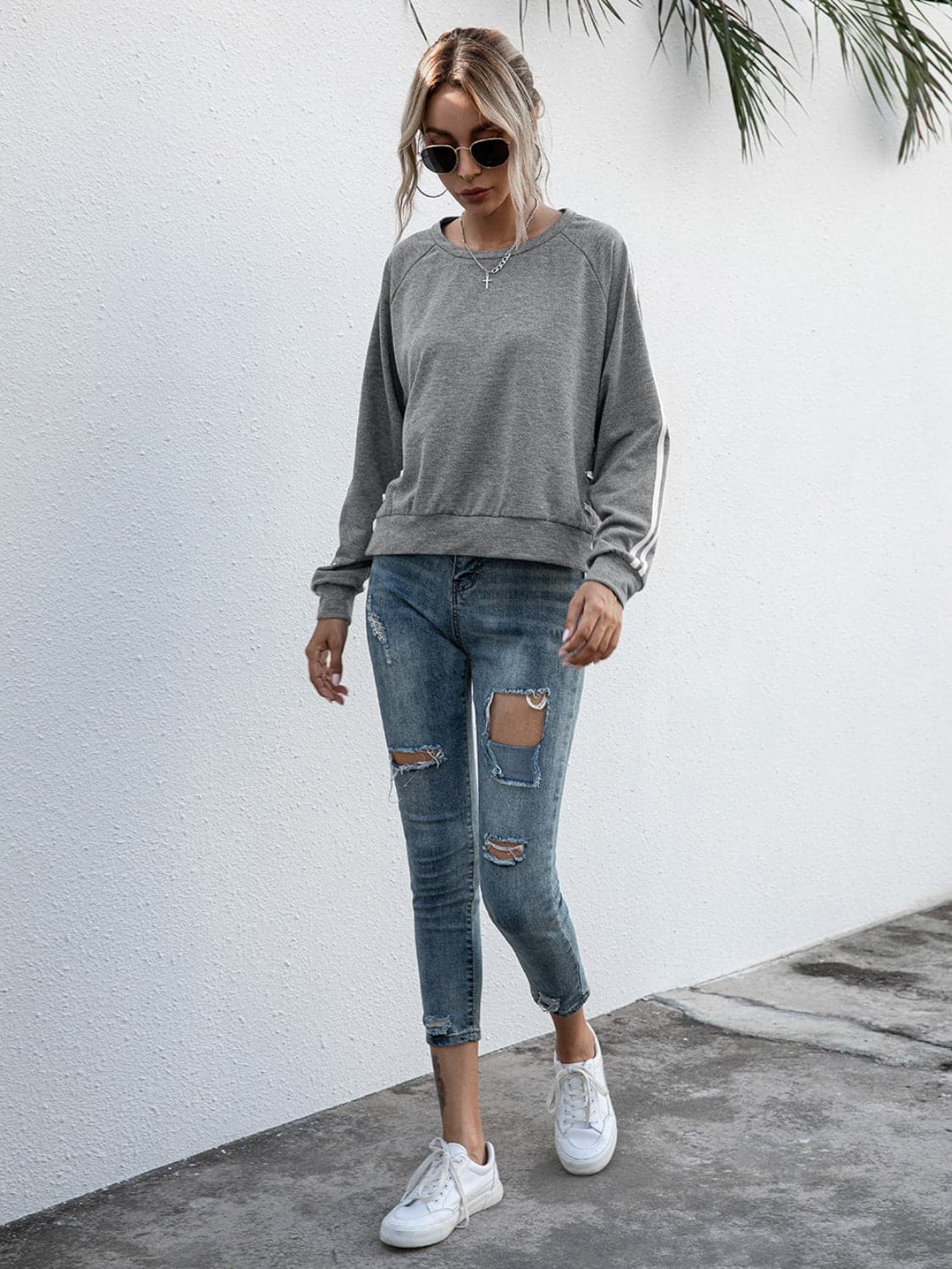 Lace-Up Round Neck Long Sleeve Sweatshirt.