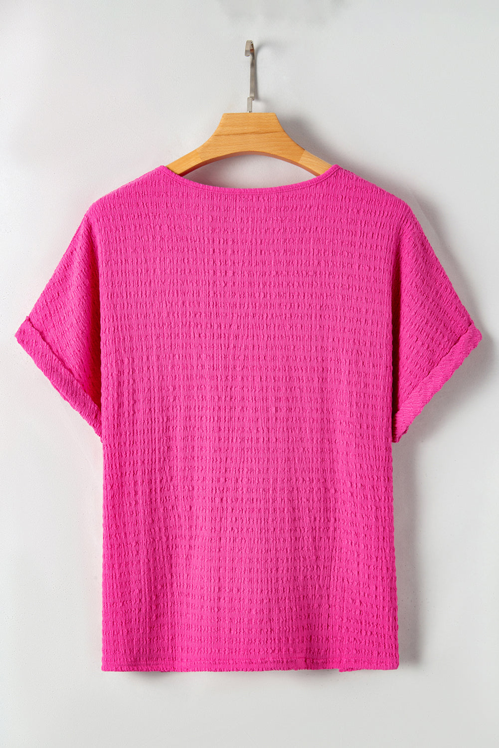 Chic bright pink plus size textured V-neck tee with folded sleeves