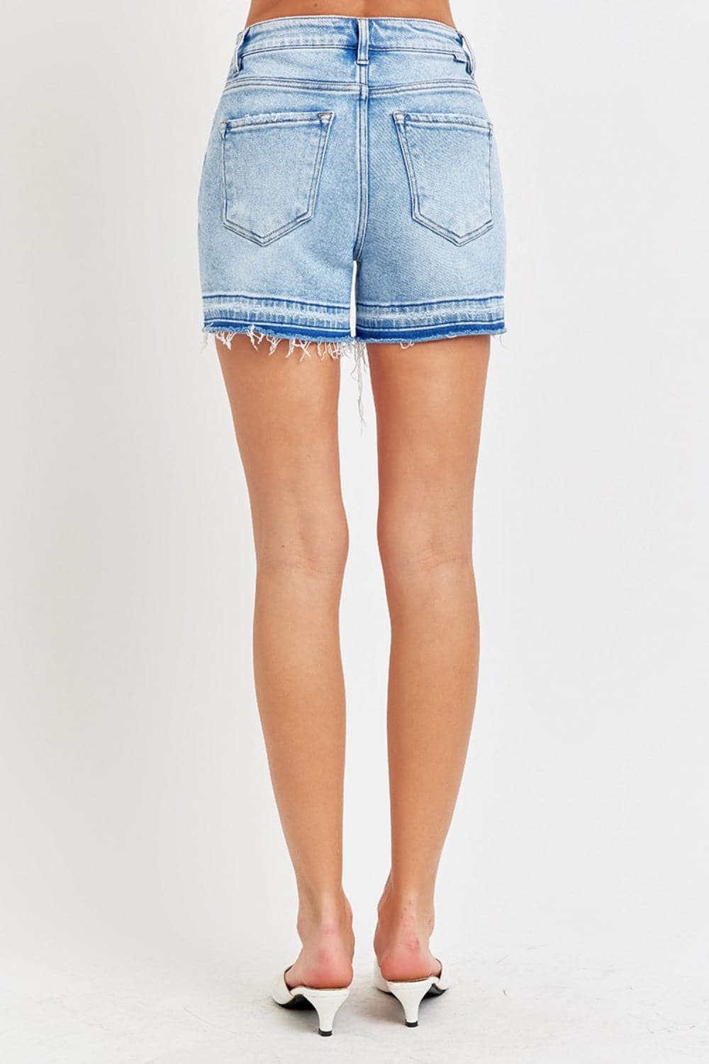 RISEN High Rise Distressed Hem Denim Shorts.