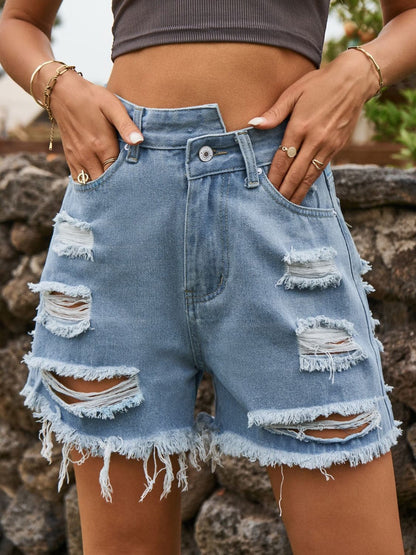 Distressed Raw Hem Denim Shorts.