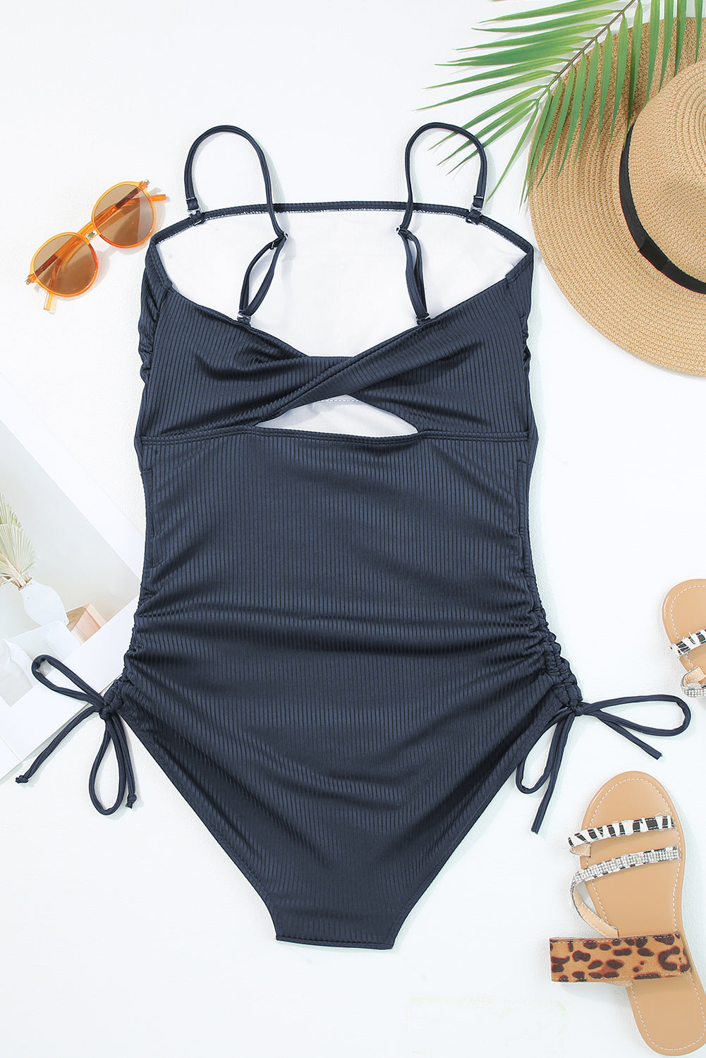 Navy blue ribbed cutout monokini with adjustable drawstring sides