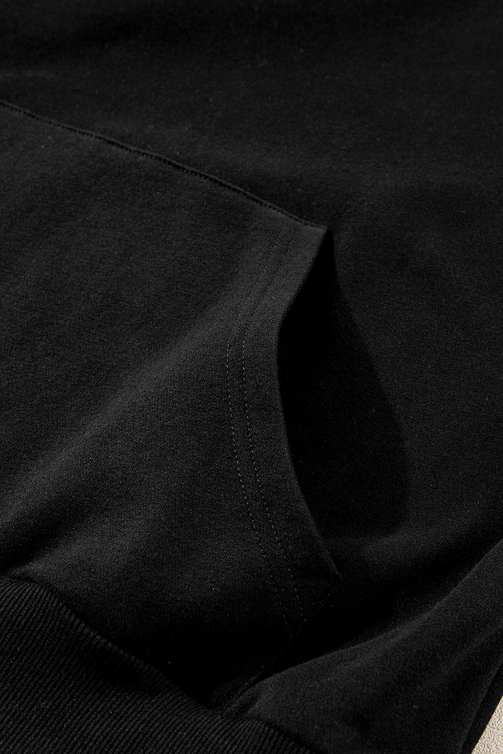 Chic black zip-up sweatshirt with kangaroo pockets