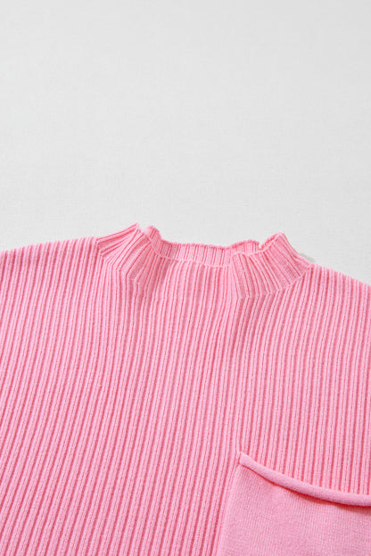 Cozy pink ribbed knit sweater with patch pocket and short sleeves