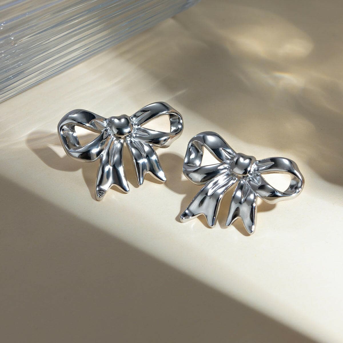 Stainless Steel Bow Stud Earrings.