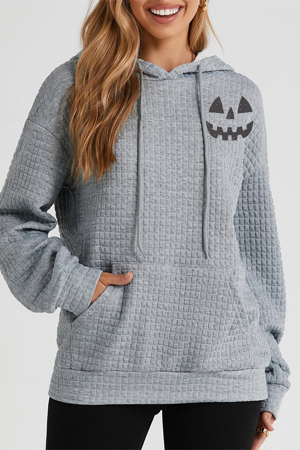 Autumn vibes pumpkin face graphic hoodie with pocket